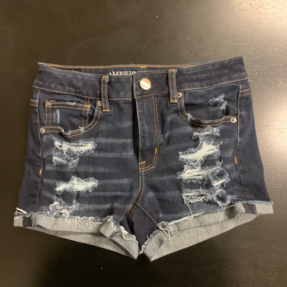 High waisted Dark blue distressed jean shorts